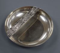 A 20th century Italian 800 white metal circular dish, with bark effect rest, signed 'Cusi'?,