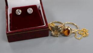 A 9ct gold citrine ring, another smoky quartz ring, a 9ct gold fine chain and a pair of 9ct gold