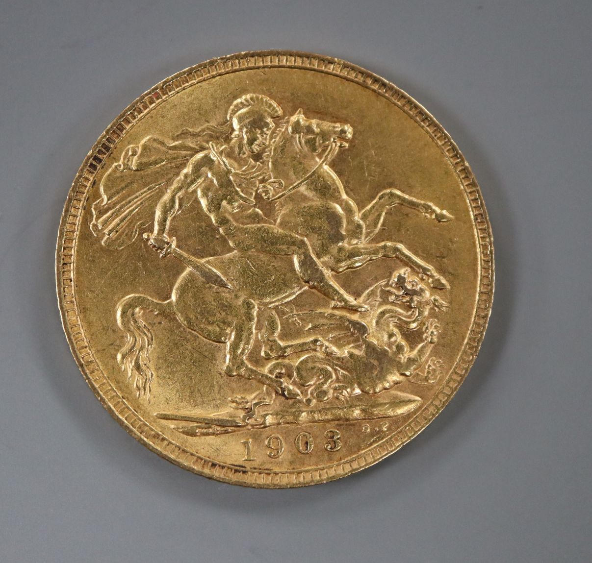 A 1903 gold full sovereign.