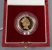 A cased 1985 gold proof full sovereign.