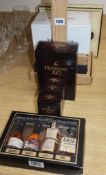 Seven assorted small boxes of small bottles of assorted cognac, bourbon whisky etc. including