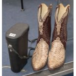 A pair of Gentlemans Cobra skin and leather cowboy boots, and a pair of binoculars