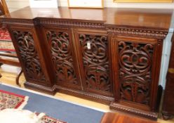 A William IV Anglo Indian carved rosewood inverse breakfront side cabinet W.190cm