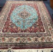 A Sarouk carpet 365 x 280cm