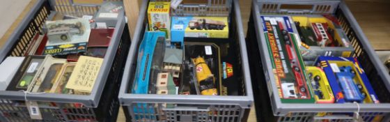 A collection of boxed diecast vintage cars, trucks and other vehicles, including a Dinky Toys