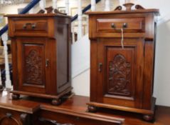 A pair of Victorian style mahogany bedside cabinets W.50cm