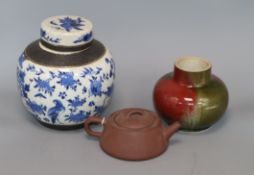 A Chinese squat baluster vase, crackle-glazed in green and red, a blue and white ginger jar and