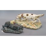 A Continental ceramic figure of a hound, on naturalistic plinth base and a stoneware model of a