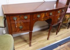 A William Tillman mahogany bowfront sideboard W.138cm