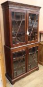 A Georgian design mahogany two-section glazed bookcase H.186cm