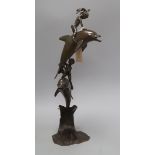 James Osborne (1940-1992). A bronze group of children riding dolphins, signed and dated 11/2000