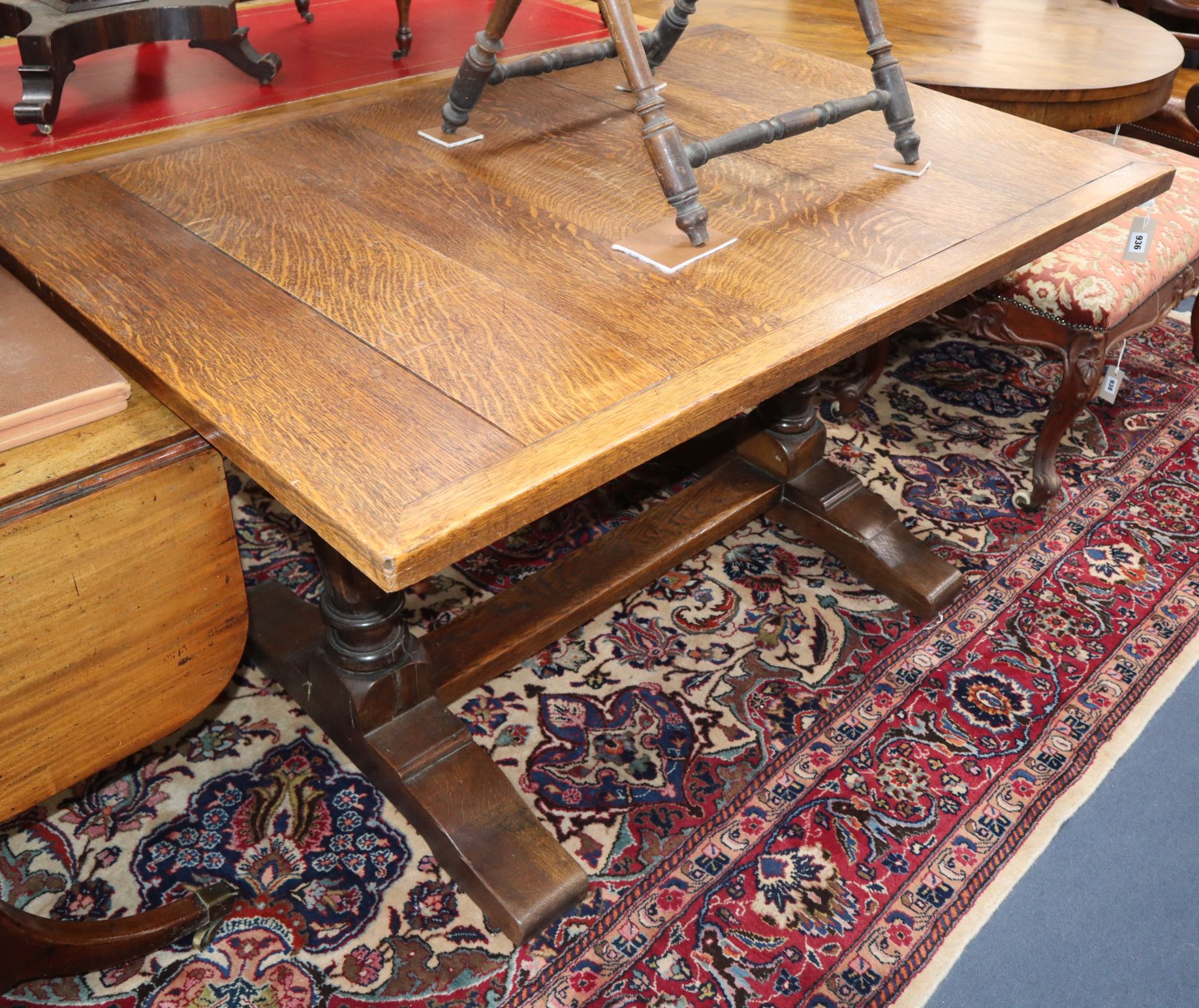 A 1920's oak refectory table L.140cm