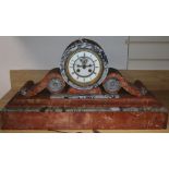 A Victorian rouge and grey marble mantel clock height 33cm, with key and pendulum