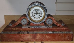 A Victorian rouge and grey marble mantel clock height 33cm, with key and pendulum