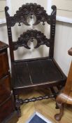 A carved oak Derbyshire chair