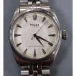 A gentleman's 1950's stainless steel Rolex Oyster manual wind wrist watch, on associated stainless