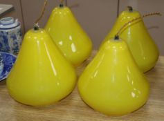 A set of four glass pear shaped light shades height 22cm