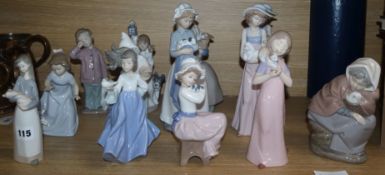 Thirteen Nao figures of children holding animals