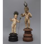 Two South American carved and painted wood figures tallest 41cm