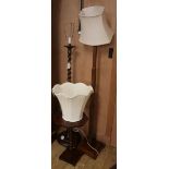 Two oak spiral twist lamp standards and an octagonal topped wine table