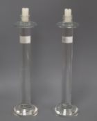 A pair of modern glass candlesticks height 36cm