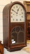 A 1920's oak wall clock H.66cm