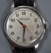 A gentleman's stainless steel Jaeger LeCoultre manual wind wrist watch, on later associated strap.