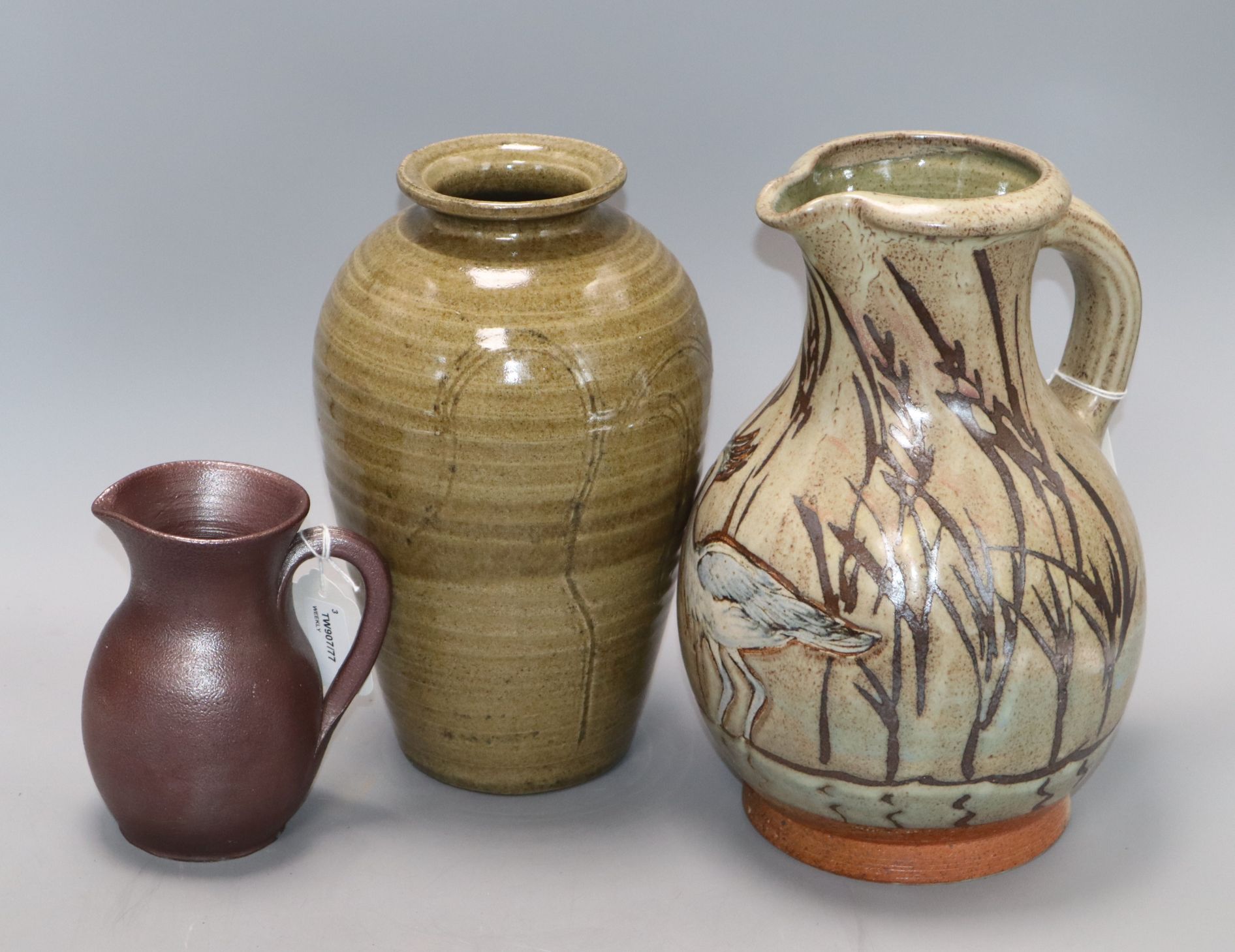 Bridget Drakeford (b. 1946), a ribbed buff-glazed studio pottery vase and two other items,
