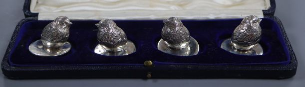 A cased set of four Edwardian novelty silver menu holders by Sampson Mordan & Co, modelled as