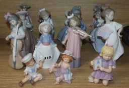 Fifteen Nao figures of children