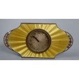 An Art Deco silver and yellow guilloche enamel desk clock with silvered Arabic dial in pierced