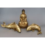 An Eastern gilt metal Buddha and a pair of resin carp Buddha 24cm