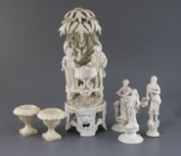 A group of Italian creamware, Naples, 19th century, including an arbour group of a lady and