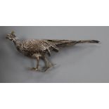 A 20th century Spanish white metal model of a pheasant (a.f.), length 28.5cm.