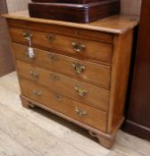 A George III fruitwood chest of drawers with brushing slide W.89cm