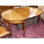 A George III mahogany D-end extending dining table, L.160cm extended, two spare leaves, no clips