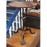 A George III style mahogany triple stem occasional table Diameter 52cm