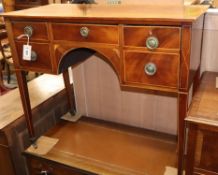 A George III mahogany kneehole dressing table W.89cm