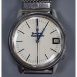 A gentleman's stainless steel Bulova Accutron date manual wind wrist watch, on expanding mesh