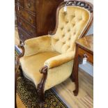 A Victorian mahogany buttonback armchair