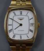 A gentleman's steel and gold plated Longines automatic wrist watch.