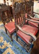 A set of six 1920's oak dining chairs, two with arms