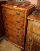 A small reproduction walnut bowfront chest W.53cm