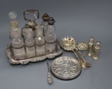 Two American sterling servers, a Swedish white metal mounted plaque, silver pepperettes and a plated