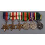 A WWII medal group awarded to BQMS J. G.Sage RA to include oak leaf and efficient service medal,