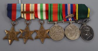A WWII medal group awarded to BQMS J. G.Sage RA to include oak leaf and efficient service medal,