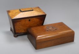 A Georgian burr maple tea caddy and a carved crested box