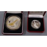 Alderney Mint £10 Concorde Final Flight silver proof coin and a Pobjoy Mint Concorde 25th