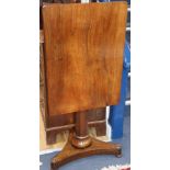 An early Victorian rosewood centre table of rectangular form on pillar and platform base W.68cm