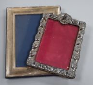A late Victorian repousse silver mounted photograph frame, Birmingham, 1900 and a modern silver